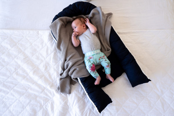 What Is A Baby Nest & Do I Really Need One?